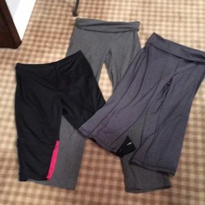 Three pairs of workout / yoga pants and capris